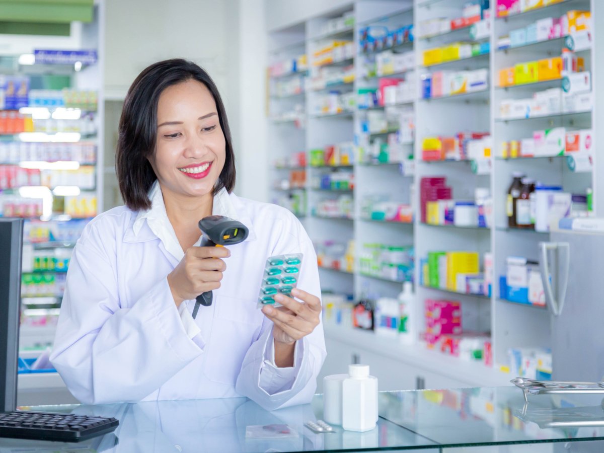 life-sciences-pharmacy-woman-scanning-drug